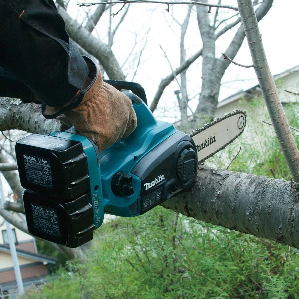 MAKITA DUC252RM2 - 36v 10" Bar Cordless Brushless Motor Chain Saw with 2x4Ah batteries and Charger - เลื่อยโซ่มอเตอร์ไร้แปรงถ่าน ใช้แบตเตอรี่ 36v บาร์โซ่ขนาด 10 นิ้ว พร้อมแบตเตอรี่ 18v 4.0Ah x 2ก้อน พร้อมแท่นชาร์จ